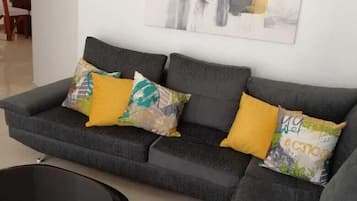 Comfort Apartment, 2 Bedrooms | Living room | 32-inch flat-screen TV with cable channels, TV