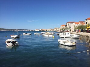 Enjoy serene harbor views from the comfort of your accommodation.