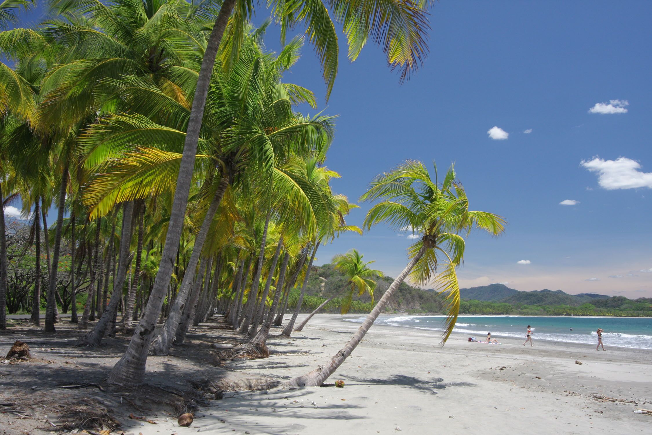On the beach, sun loungers, beach towels