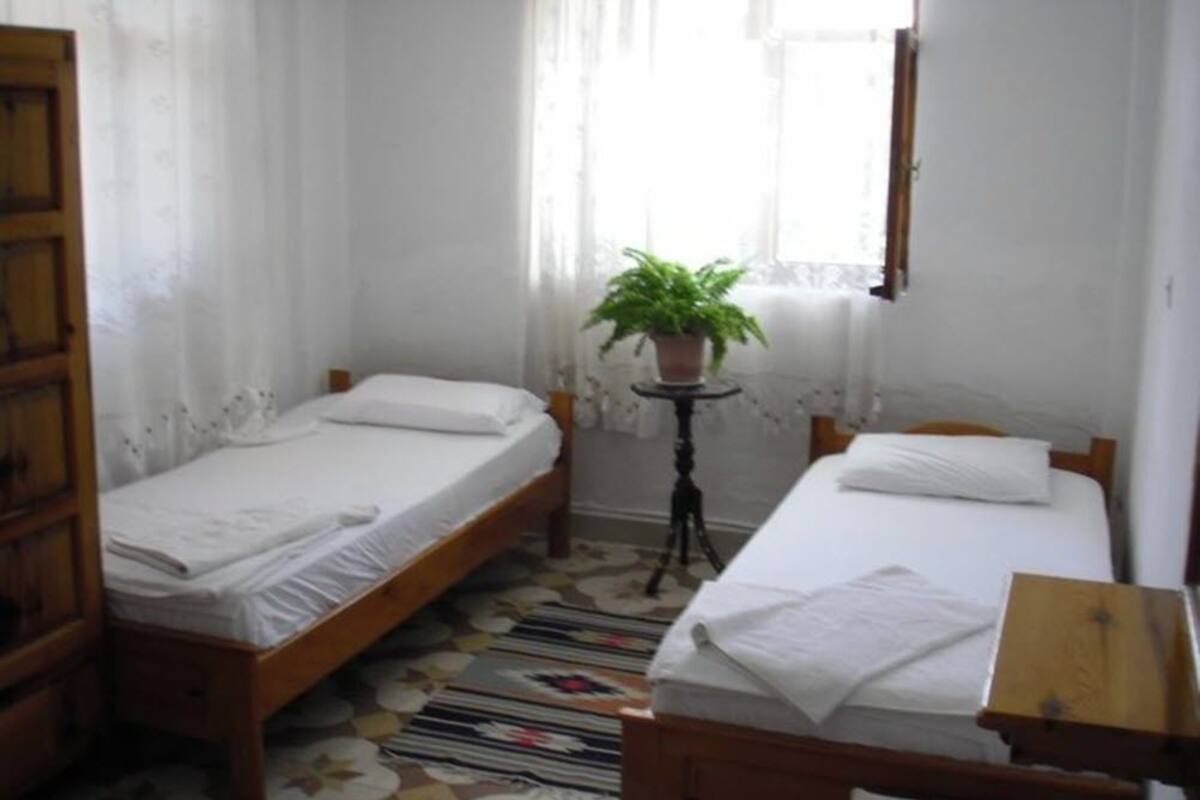 Minibar, desk, bed sheets