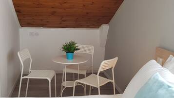 Family Quadruple Room | Minibar, desk, free WiFi, bed sheets