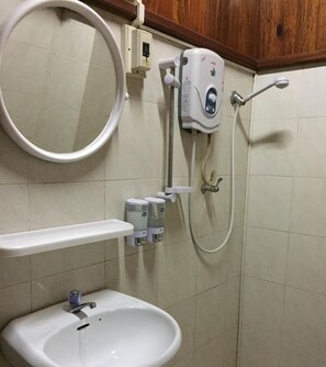 Shower, free toiletries, slippers, towels