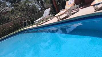 3 outdoor pools, pool umbrellas, pool loungers