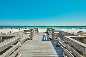 On the beach, sun-loungers, beach towels