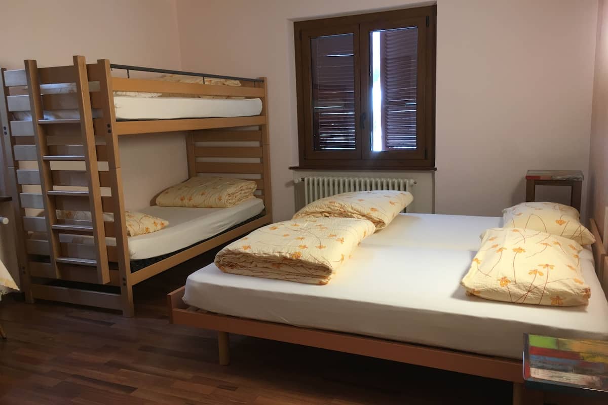 family quadruple room, multiple beds | bathroom shower