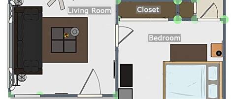 A floor plan of a hotel room with a living room, closet, bedroom, and porch.