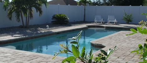 A heated pool, a lap pool, sun loungers