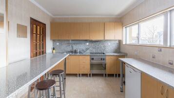 Microwave, coffee/tea maker, cookware/dishes/utensils