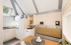 Fridge, stovetop, dishwasher, coffee/tea maker