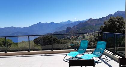 Recent house facing the creeks of Piana