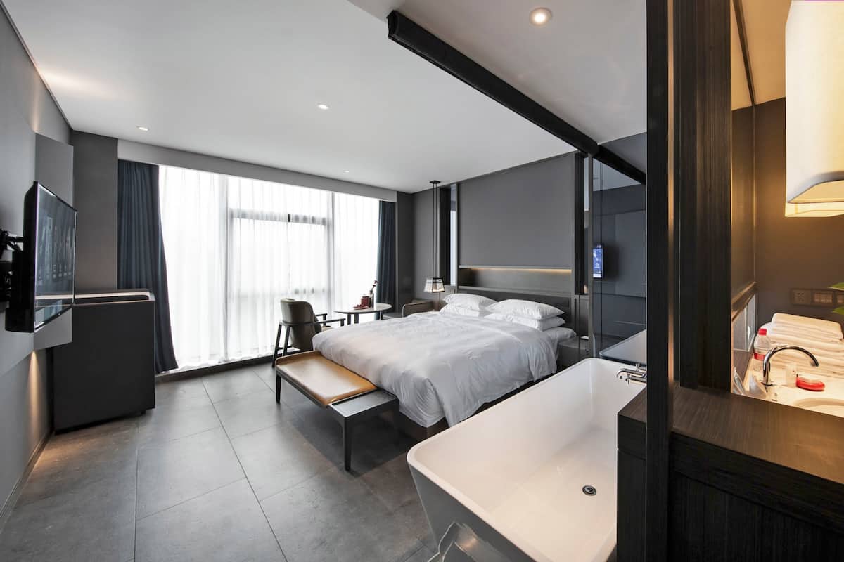 Superior Double Room | Minibar, in-room safe, desk, blackout drapes