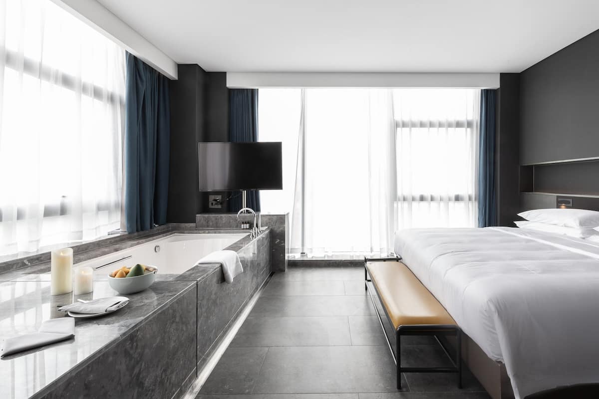 Premier Suite, 2 Bedrooms | Minibar, in-room safe, desk, blackout drapes