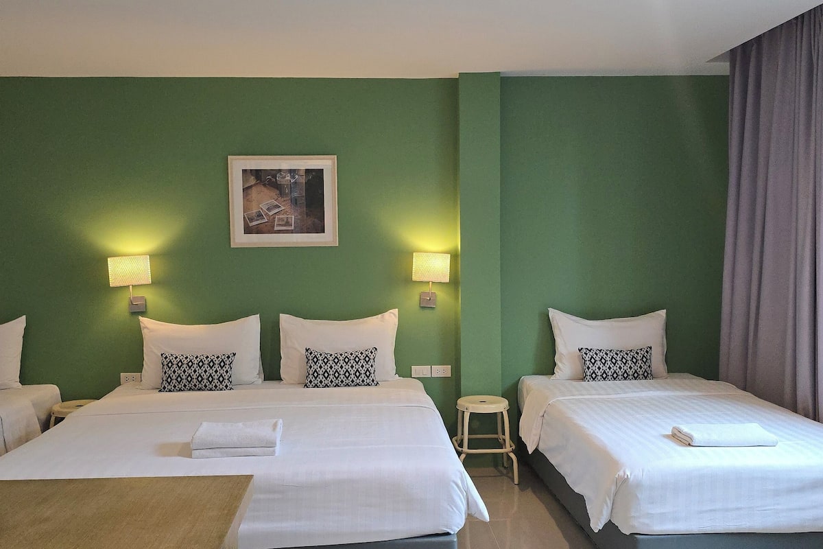 Deluxe Quadruple Room - Building 1 | 1 bedroom, blackout curtains, free WiFi, bed sheets