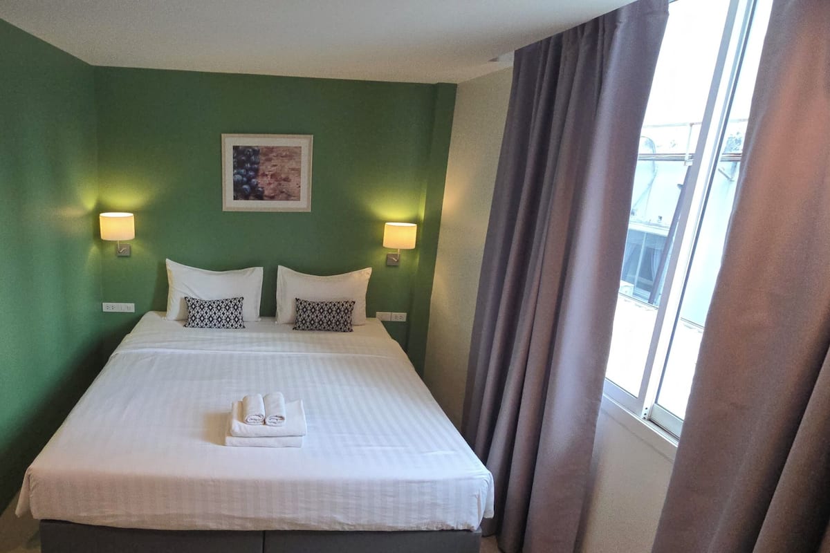 Deluxe Room with window - Building 1 | 1 bedroom, blackout curtains, free WiFi, bed sheets