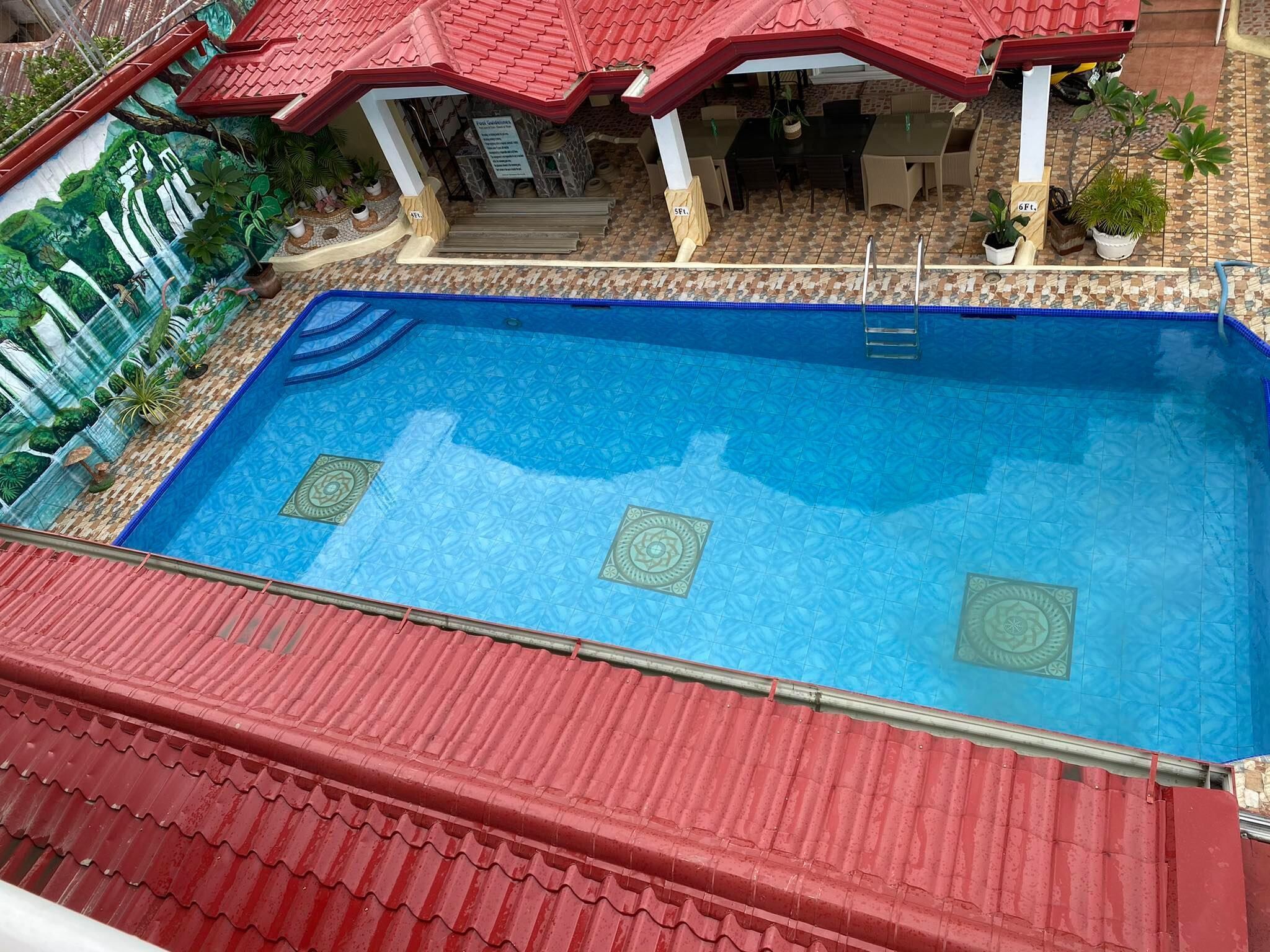 Outdoor pool, open 6 AM to 10 PM, sun loungers