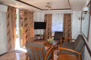 Exclusive Apartment, 2 Bedrooms | Living room | 32-inch flat-screen TV with cable channels, TV - Villa Prescilla (Dumaguete)