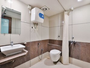 Deluxe Double Room, 1 Queen Bed | Bathroom | Shower, rainfall showerhead, hair dryer, towels - Hotel Salute (Ahmedabad)
