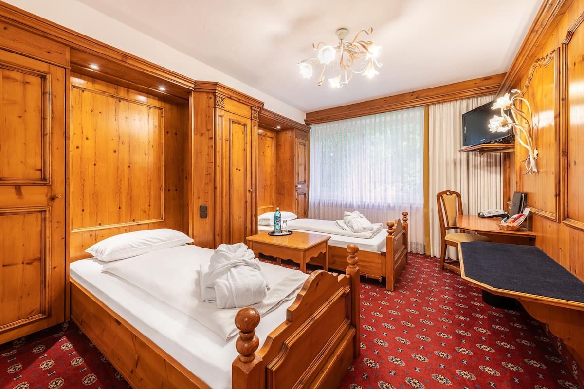 classic twin room | bathroom | free toiletries, hair dryer, bathrobes, towels