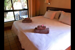 Family Chalet, 3 Bedrooms, Non Smoking, River View | 1 bedroom, premium bedding, in-room safe, iron/ironing board - Ekuthuleni Holiday Resort Chalet 2 (Hoedspruit)