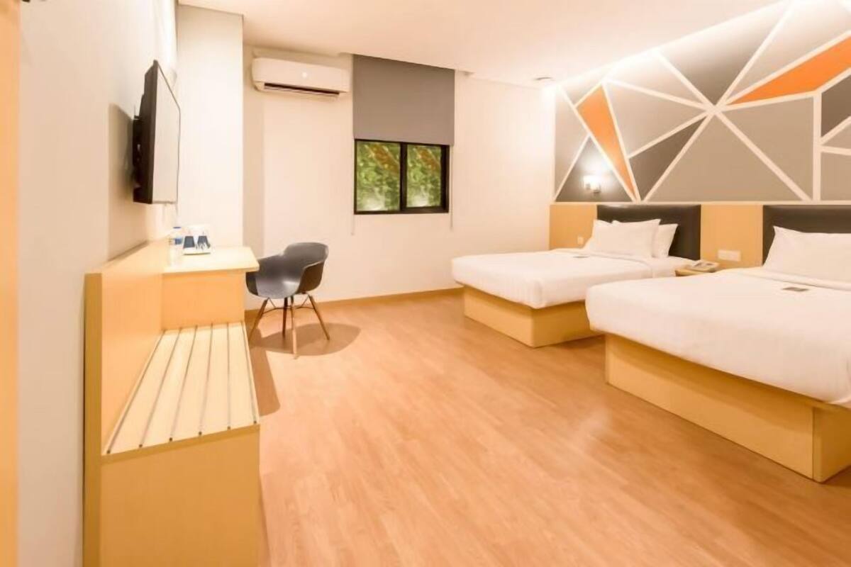 Luxe beddengoed, een bureau, geluiddichte muren, gratis wifi