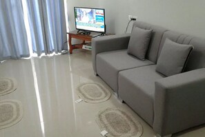 3 Bedroom Townhouse | Living area | Flat-screen TV, DVD player - Alliyah's Townhouse (Quezon City)