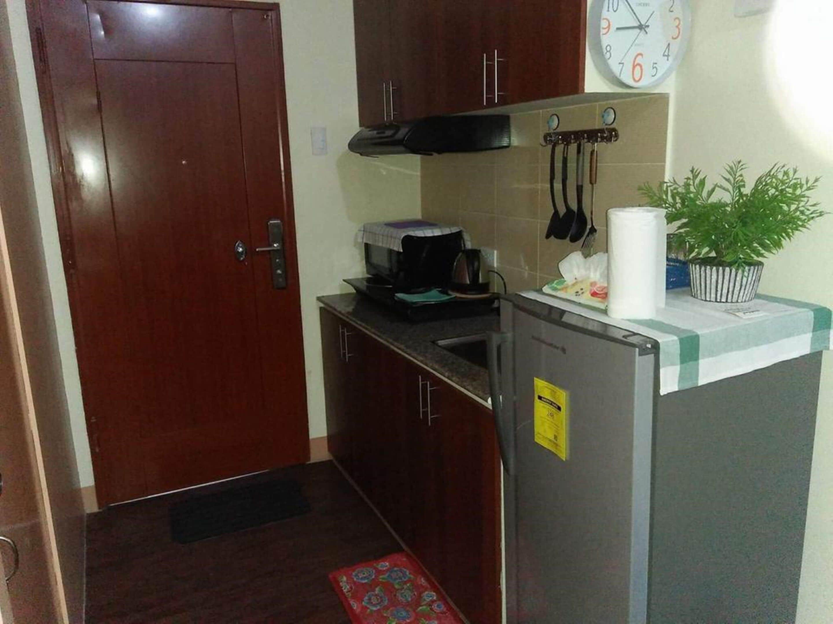 1 Bedroom Unit | Private kitchen | Full-sized fridge, microwave, stovetop, dishwasher
