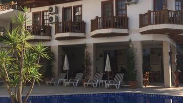 Seasonal outdoor pool, open 8 AM to 8 PM, free pool cabanas