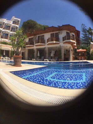 Seasonal outdoor pool, open 8 AM to 8 PM, free cabanas, pool umbrellas