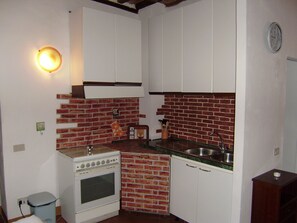 Apartment, 2 Bedrooms | Private kitchen | Fridge, stovetop, coffee/tea maker, cookware/dishes/utensils - La Fattoria Montalcinello (Chiusdino)