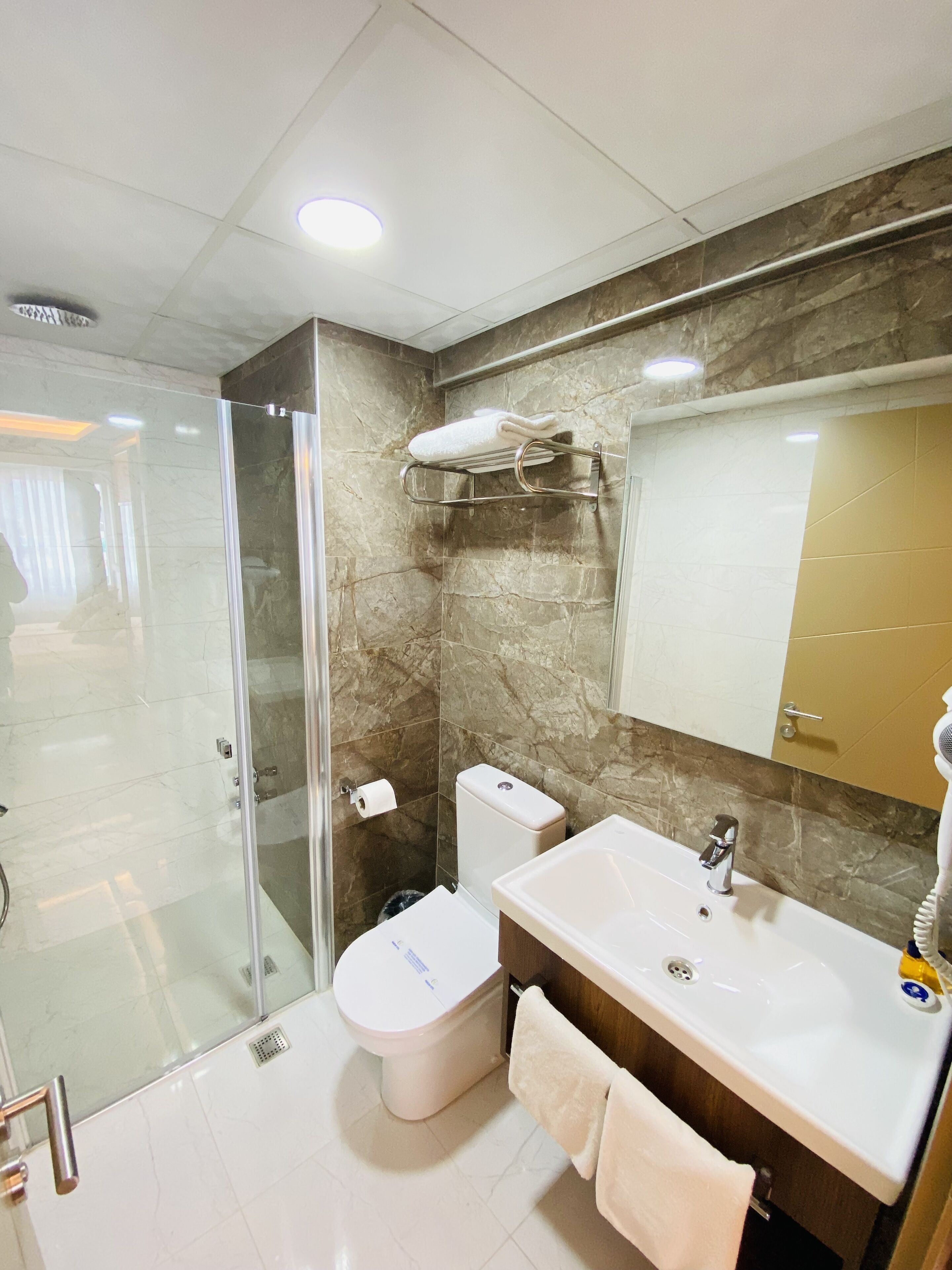 shower, free toiletries, hair dryer, slippers