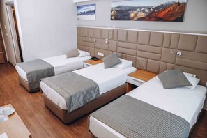 Triple Room | Minibar, in-room safe, desk, soundproofing - Hakcan Hotel (Izmir)
