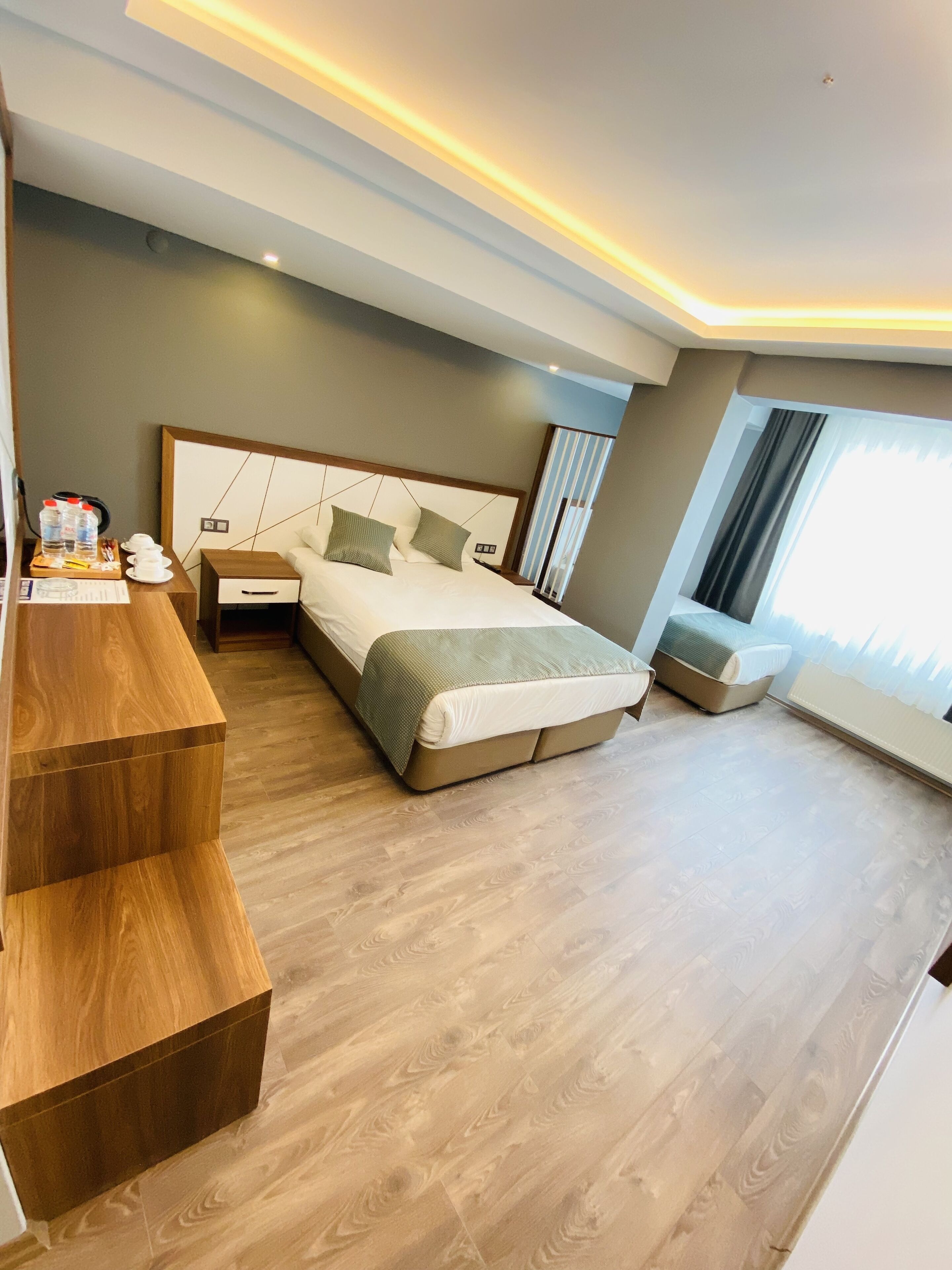 family room, multiple beds | minibar, in-room safe, desk, soundproofing