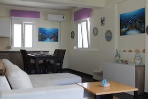 Comfort-Haus, Mehrere Betten, Raucher | Wohnbereich | Flachbildfernseher, Kamin