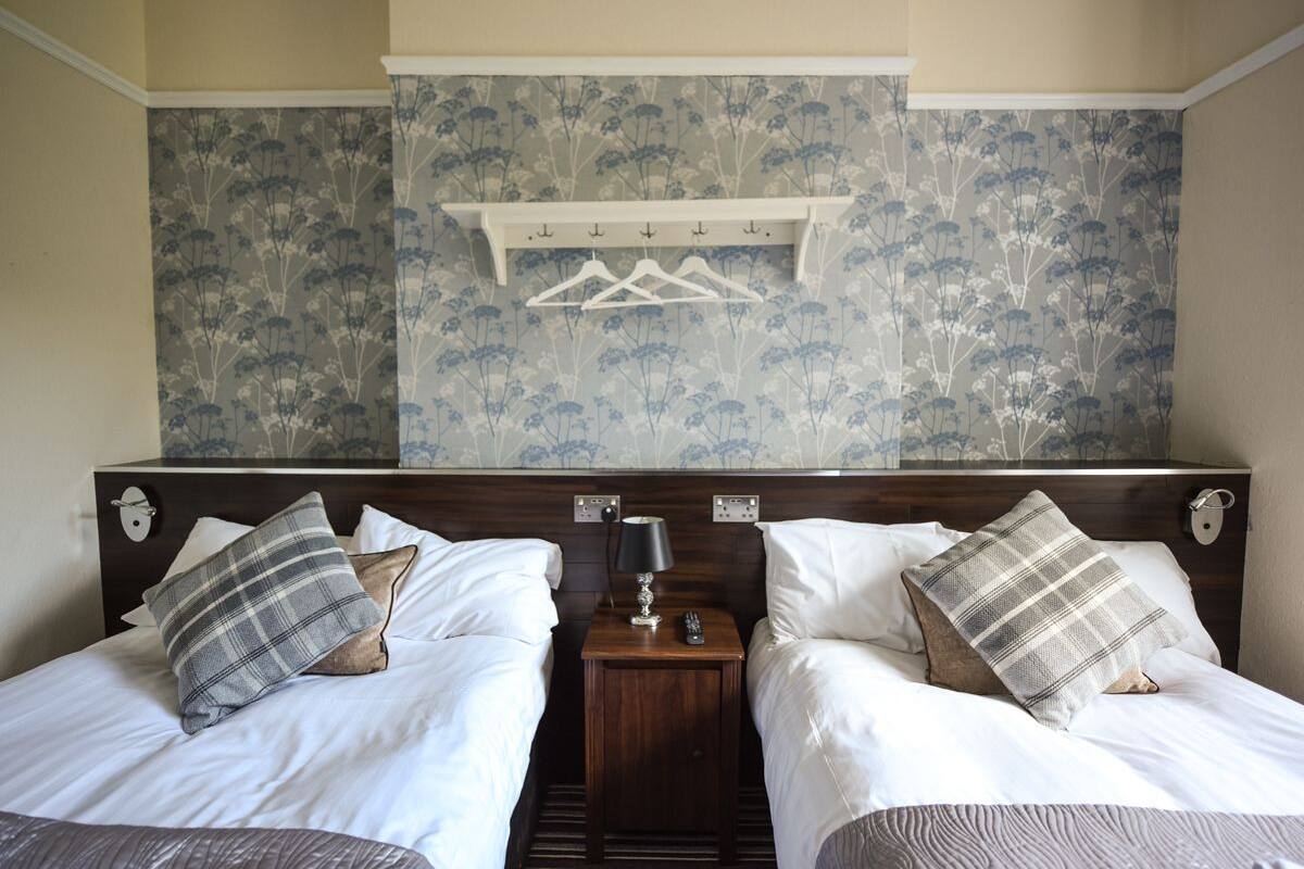 Twin Room | Iron/ironing board, free WiFi