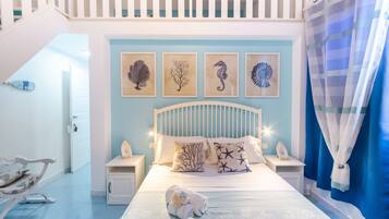 Premium Quadruple Room | In-room safe, individually decorated, individually furnished, desk