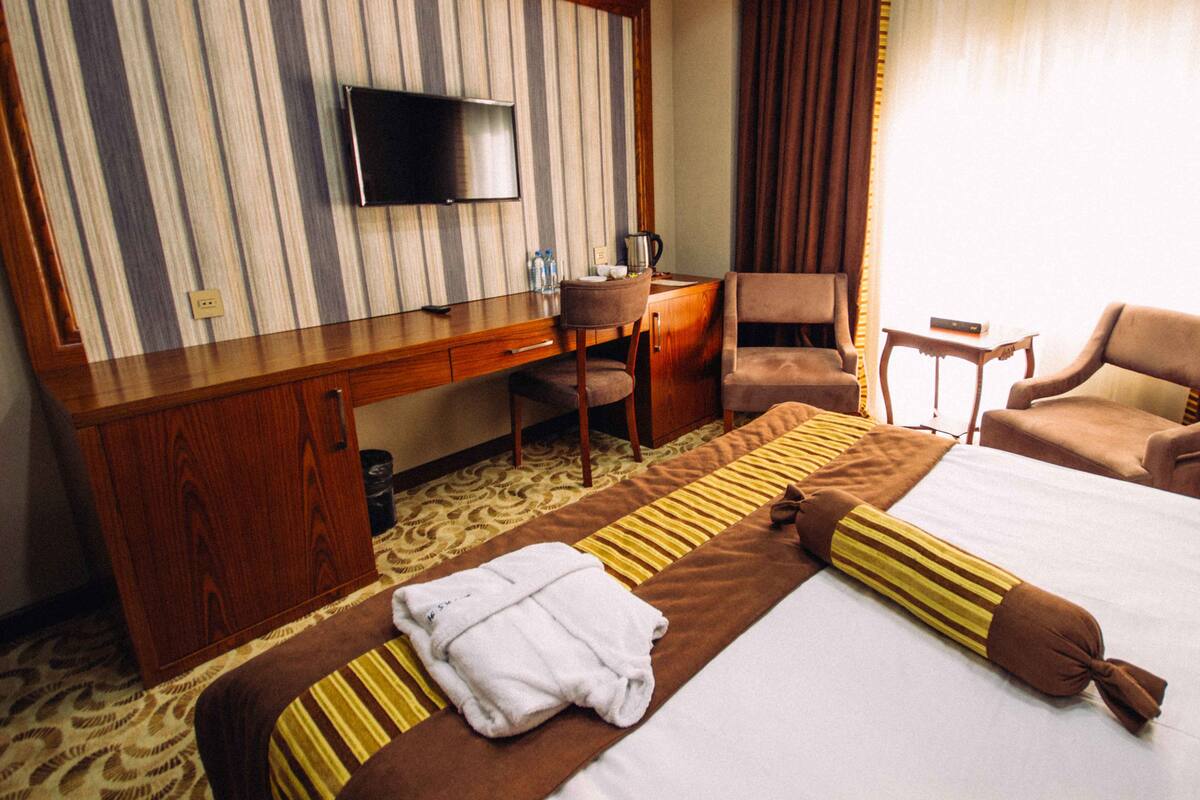 Economy Single Room, Smoking | 1 bedroom, minibar, in-room safe, desk