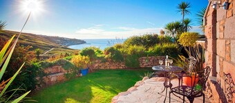 The Studio Cottage, med, havutsikt, hage, fantastisk beliggenhet ved stranden