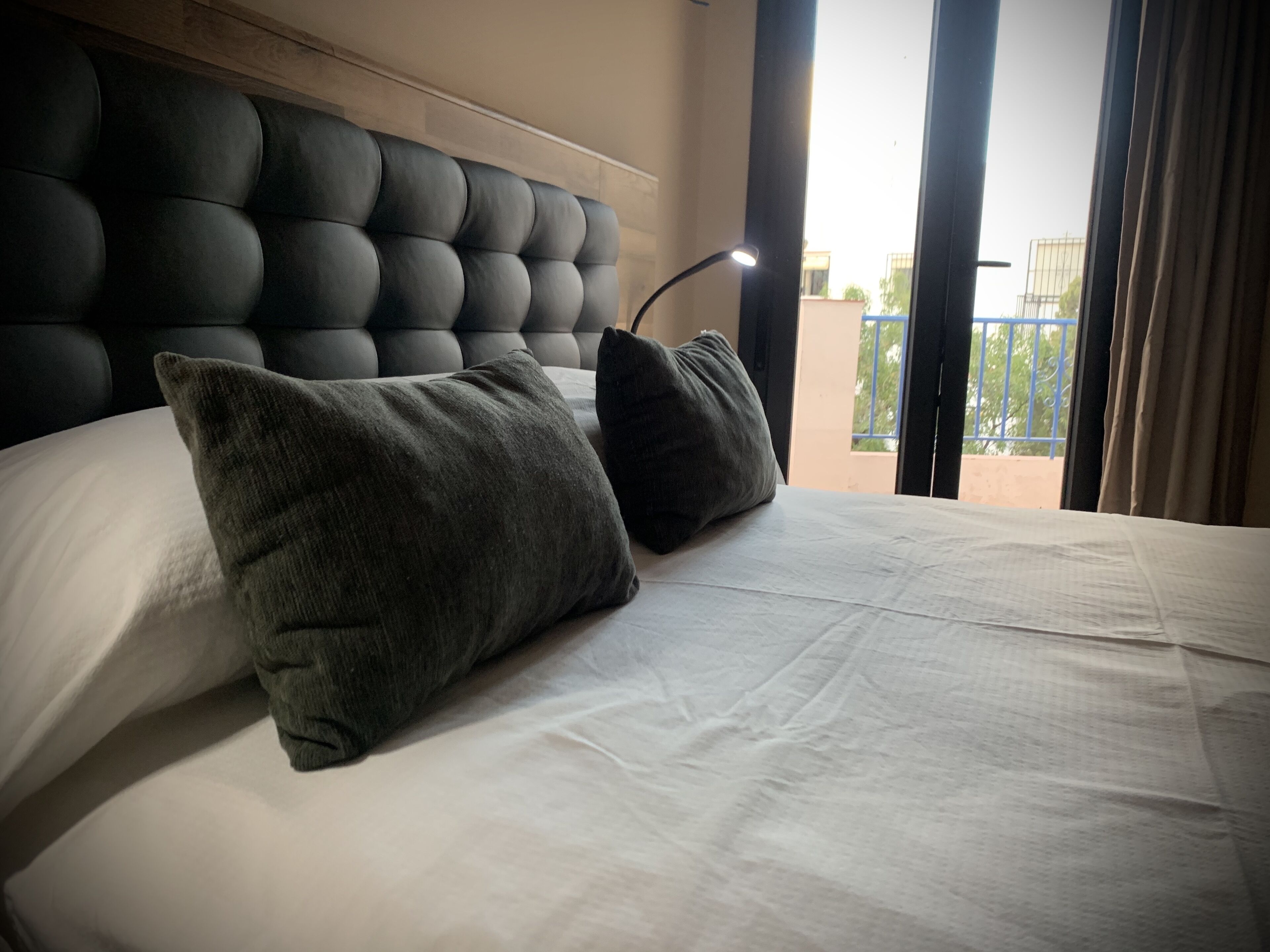 Premium bedding, down comforters, memory foam beds, minibar