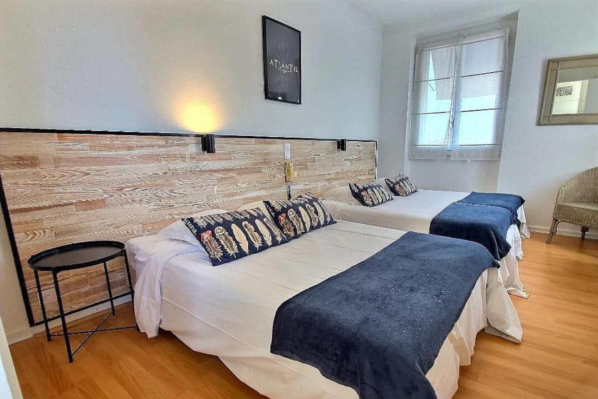 Standard Quadruple Room | In-room safe, desk, blackout curtains, iron/ironing board