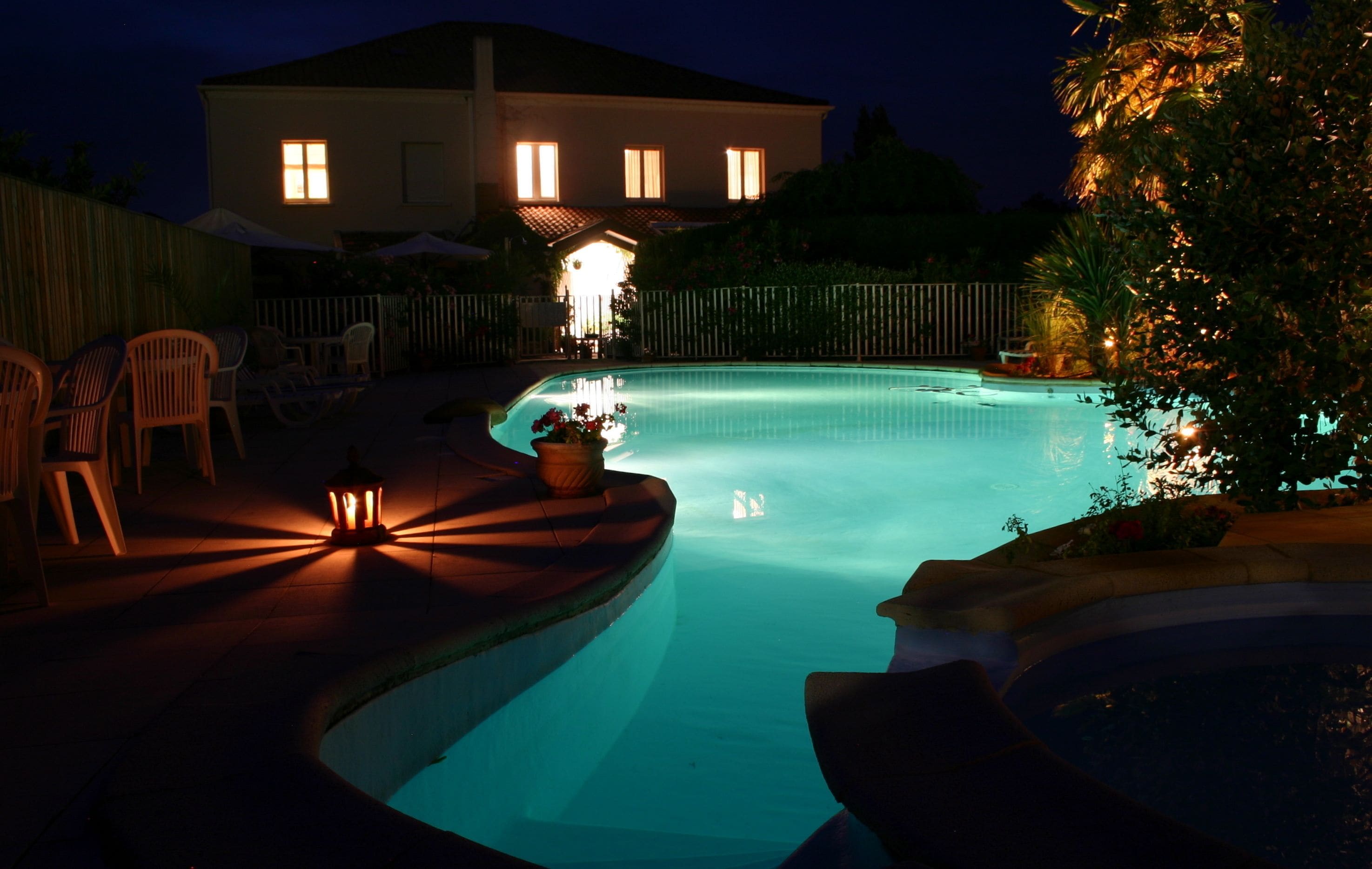 Outdoor pool, open 9 AM to 7 PM, sun loungers