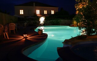 Outdoor pool, open 9 AM to 7 PM, sun loungers