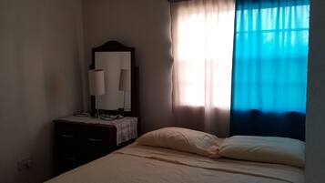 Comfort Room, 1 Double Bed, Private Bathroom, Ocean View | 1 bedroom, desk, iron/ironing board, free WiFi