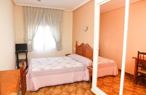 Down comforters, blackout drapes, rollaway beds, free WiFi