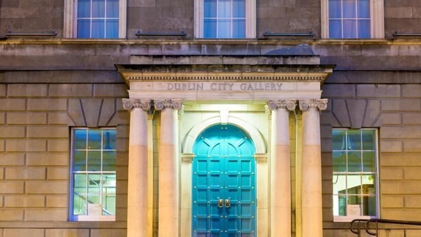 The Dublin City Gallery entrance with a blue door and classical columns. - Greeg Court (Dublin)