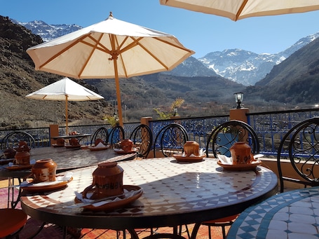 Breakfast, lunch, dinner served; local cuisine, garden views