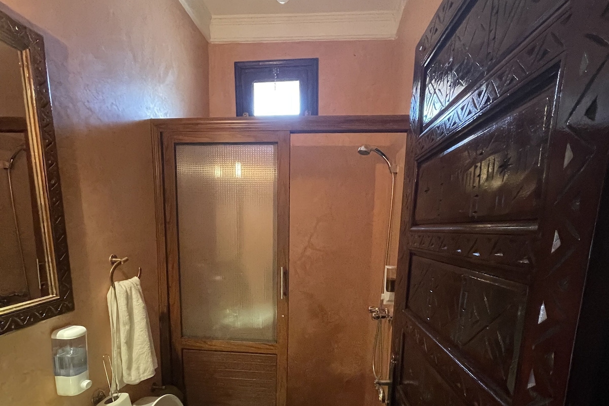 Bathroom | Shower, hair dryer, bathrobes, slippers