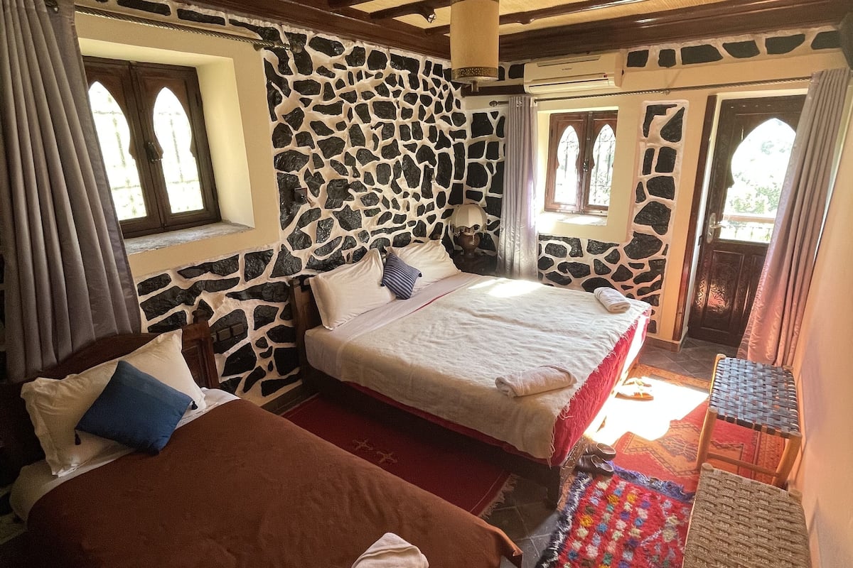 panoramic triple room, 3 single beds, balcony, mountain view | 1 bedroom, premium bedding, pillow-top beds, individually decorated