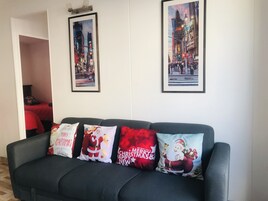 Family Apartment, 3 Bedrooms, Non Smoking | Living area | Flat-screen TV