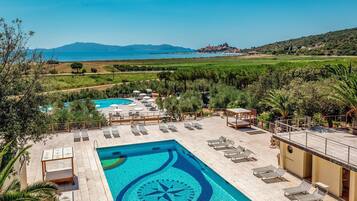 Seasonal outdoor pool, pool umbrellas, pool loungers