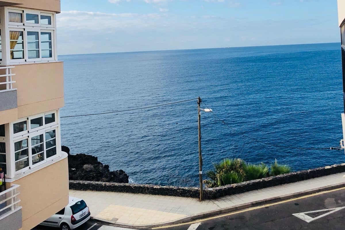 Deluxe tweepersoonskamer, balkon | Uitzicht op strand/zee